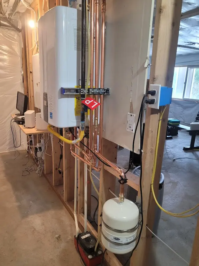 Licensed plumber repairing a kitchen sink in Paramount